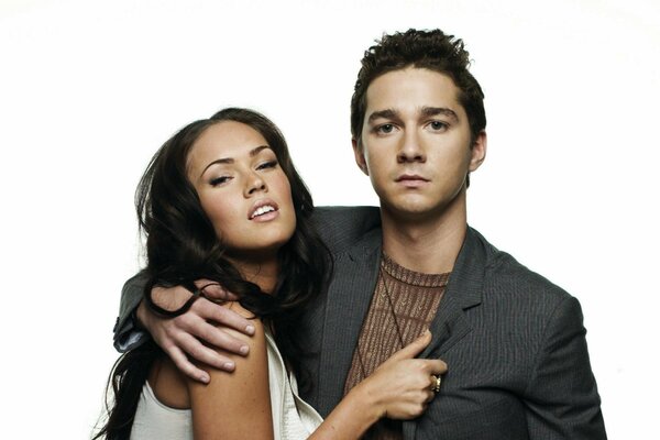 Hugging young actor with an actress
