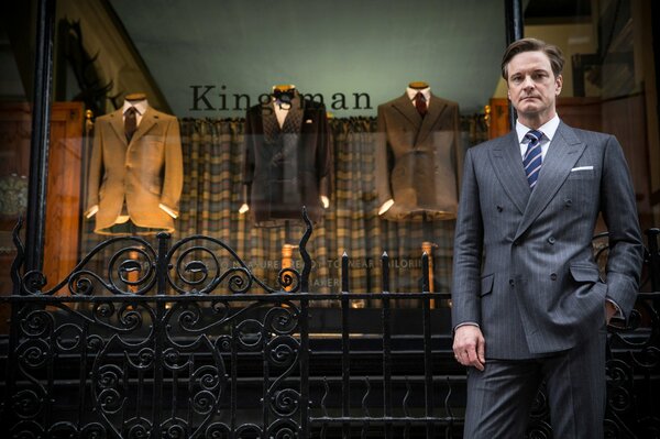 Colin Firth with costumes from the movie Kingsman