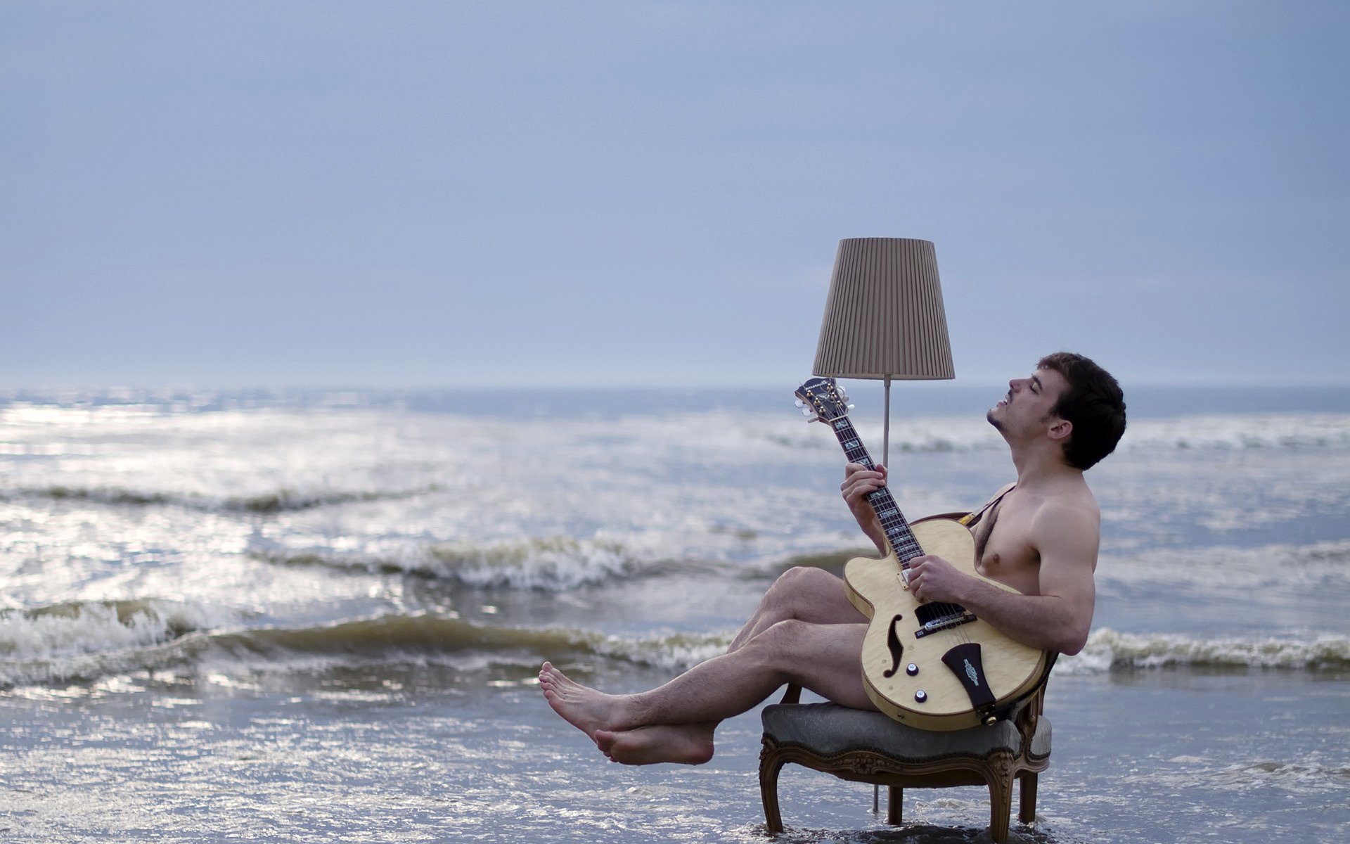 ituation mood sea shore surf armchair chair guitar floor lamp music