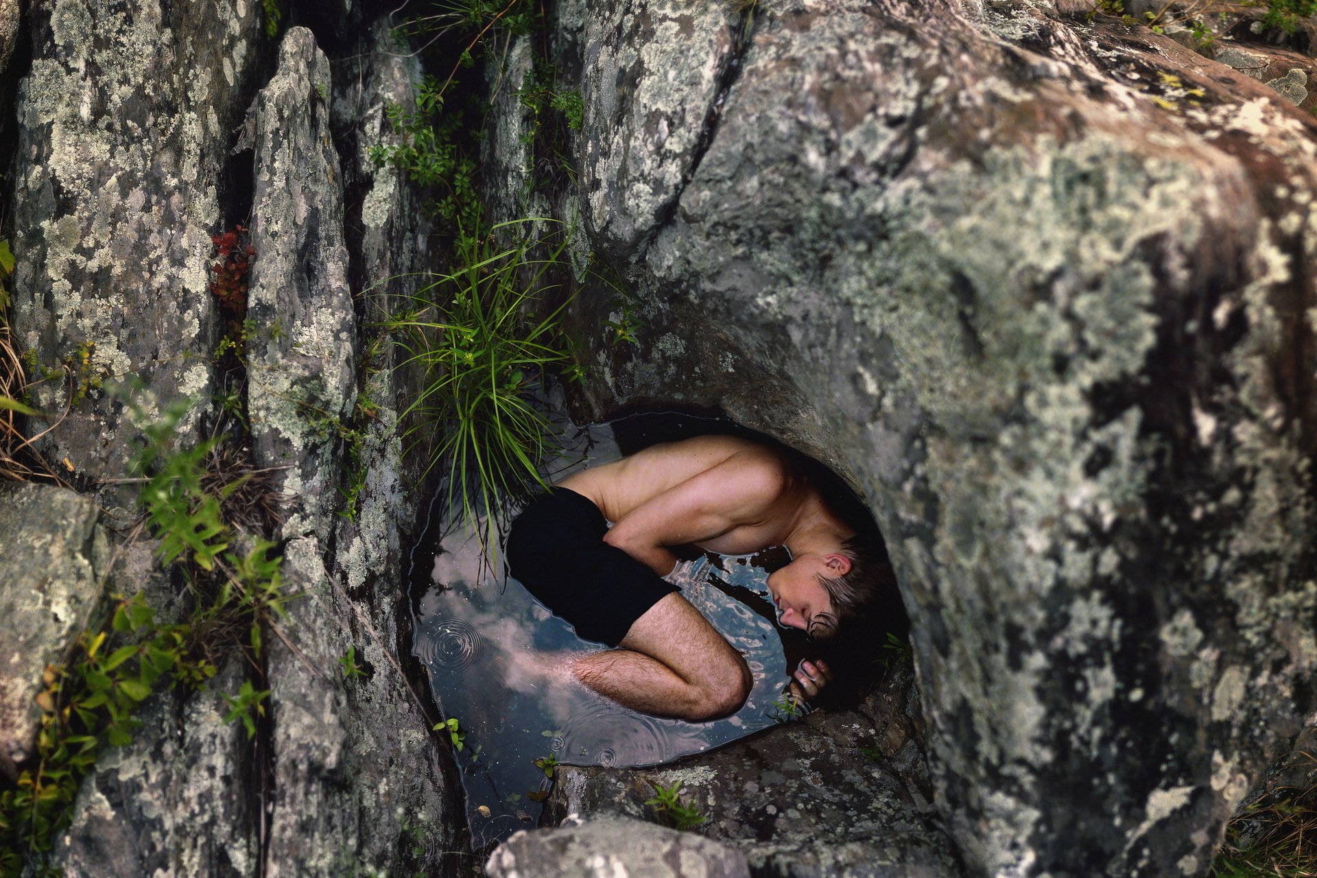 men rock stones water loneliness hopelessness addict alcoholic longing pain sadness suicide