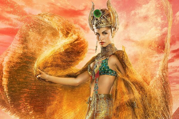 Passionate woman in golden outfits