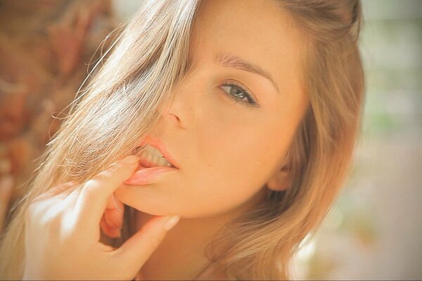 A beautiful girl. Brown-haired. Face