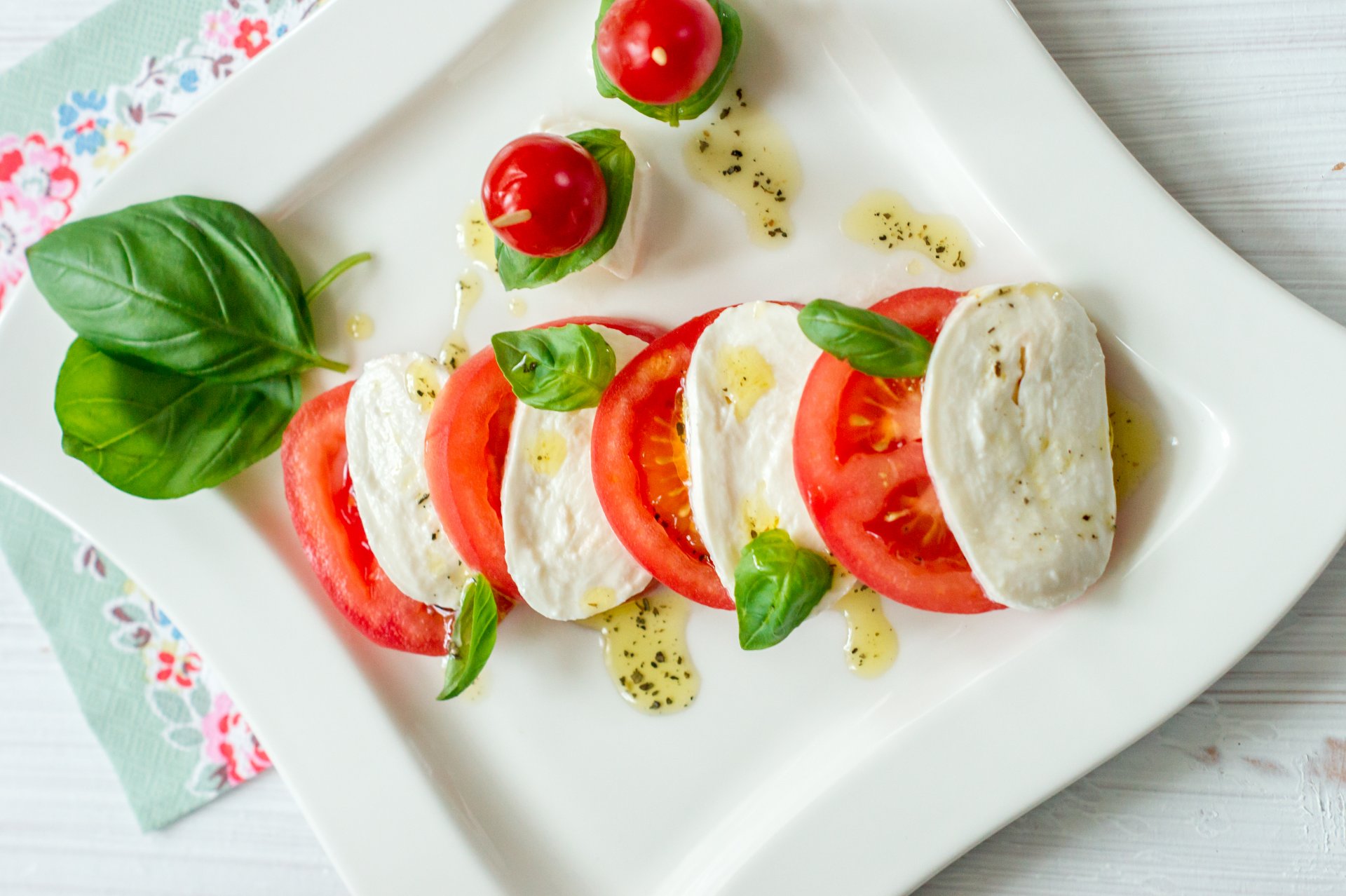 alad caprese food snack basil tomatoes mozzarella cheese oil