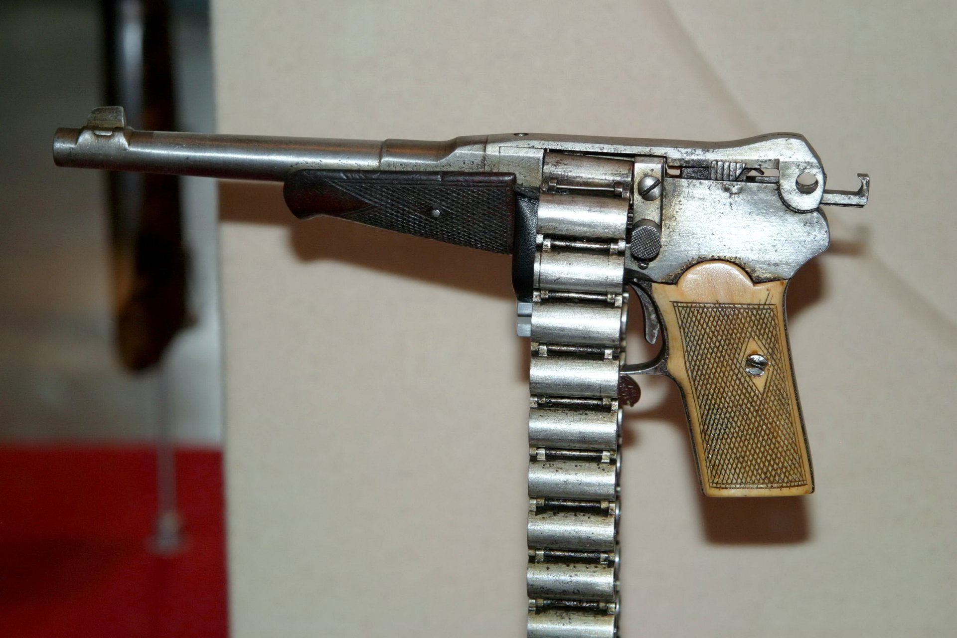very interesting firearms weapons acting rare sample homemade pistol the only one in the world large enough caliber tape feed cartridges original solution feed ammunition absence magazine availability forearm short barrel tape to
