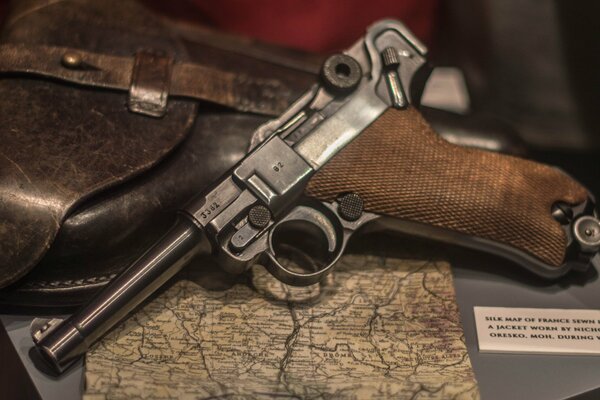 The old gun is lying on the table