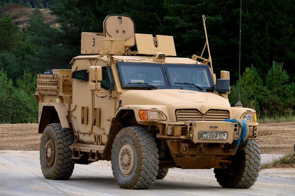 Armored fighting vehicle on the background of the road
