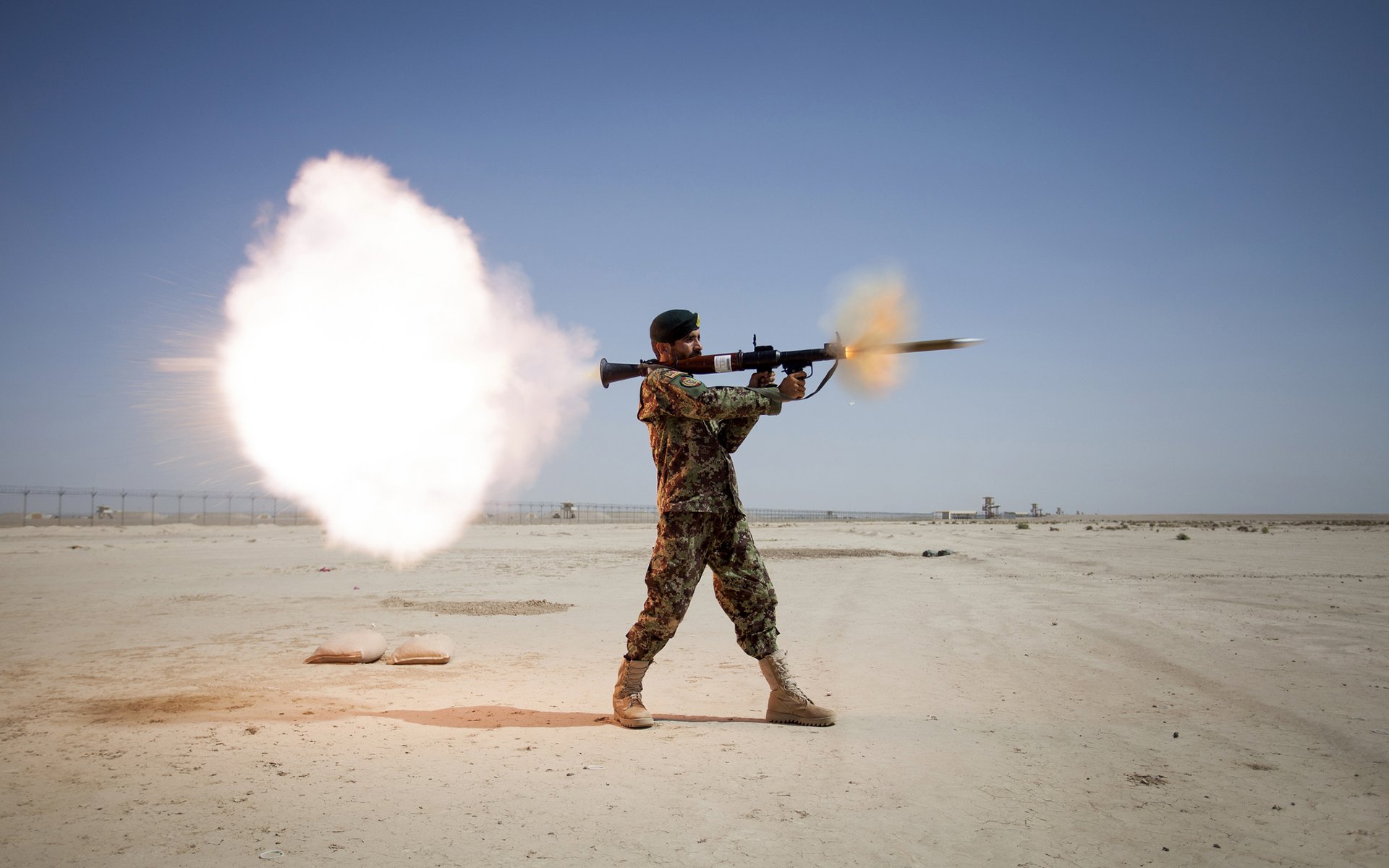 rpg rocket launcher weapon men explosion sky the field
