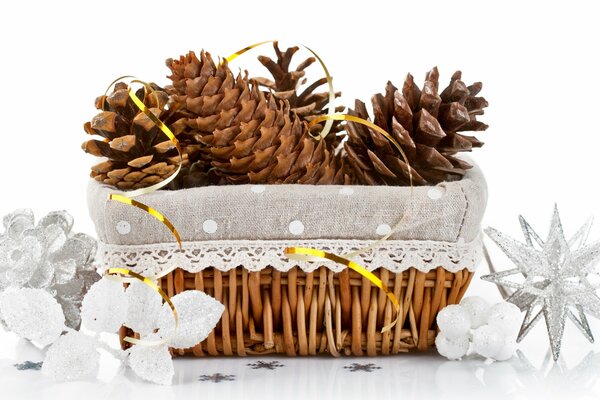 Basket with cones and white ornaments