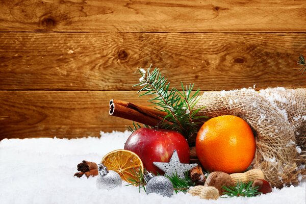 Snow-covered tangerines at Christmas