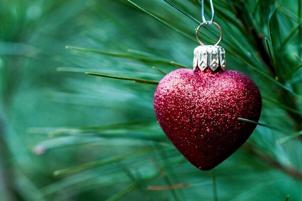 Christmas toy-heart on a fir tree