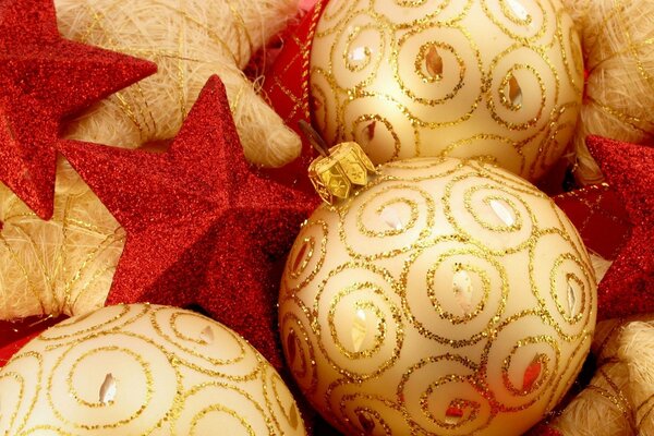 Golden balls with red stars