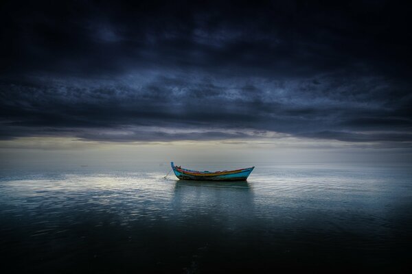 Boat in the sea on the horizon background