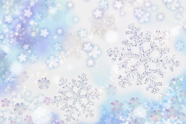 Shiny snowflakes on a blue and white background
