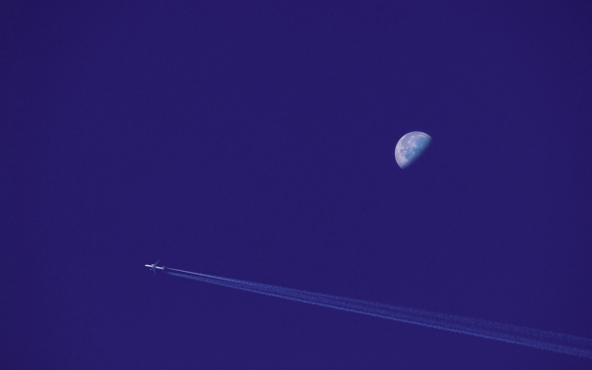 plane moon sky
