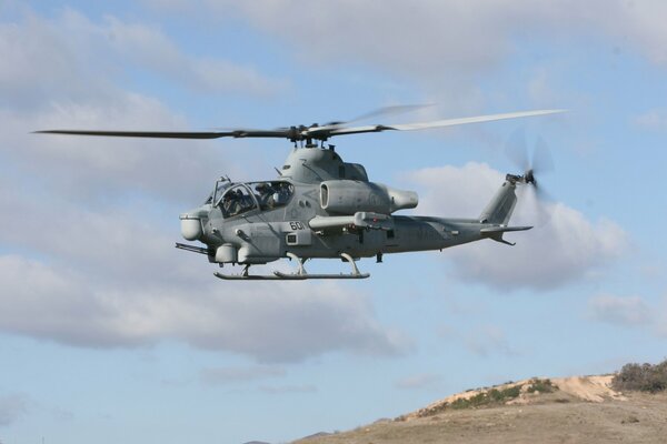 The helicopter is flying low big