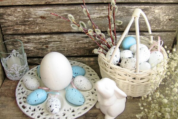 Easter still life with flowers, rabbit and eggs