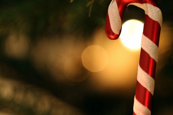 Christmas lollipop on the background of lights