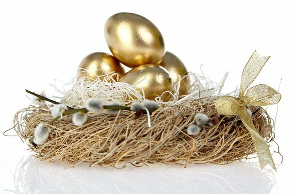 Nest with golden eggs and willow