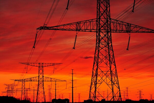Towers on the background of a fiery sunset
