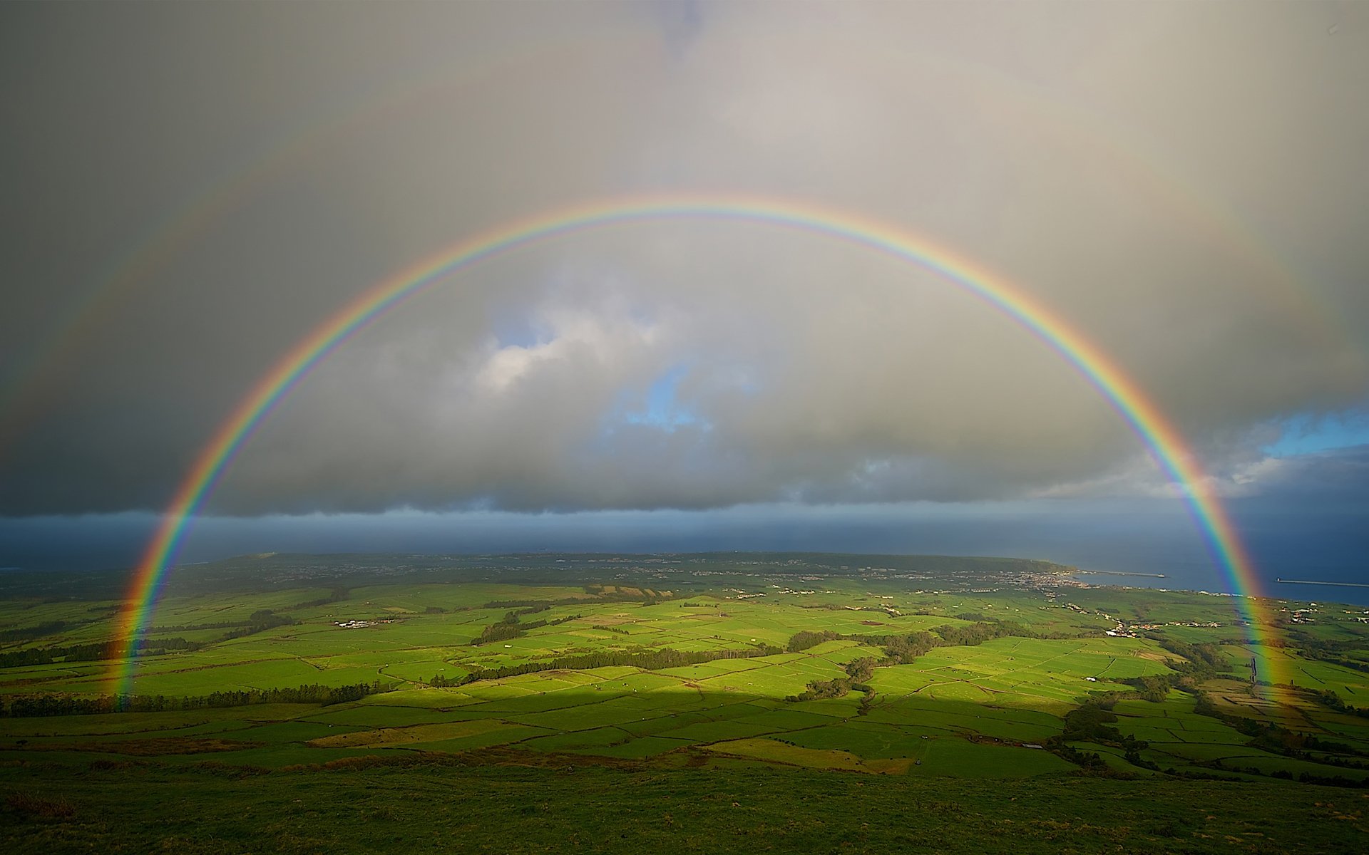 rainbow sky sea