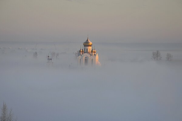 A white temple can be seen in the distance