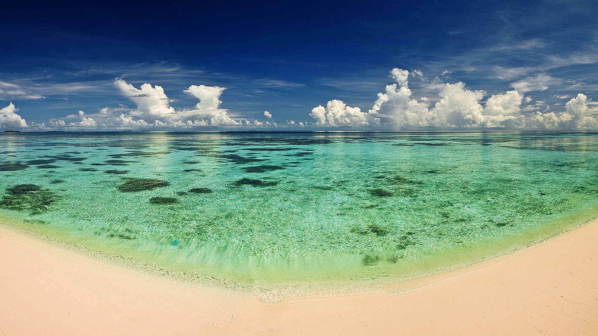 ea ocean heat beach sand water transparency sky cloud