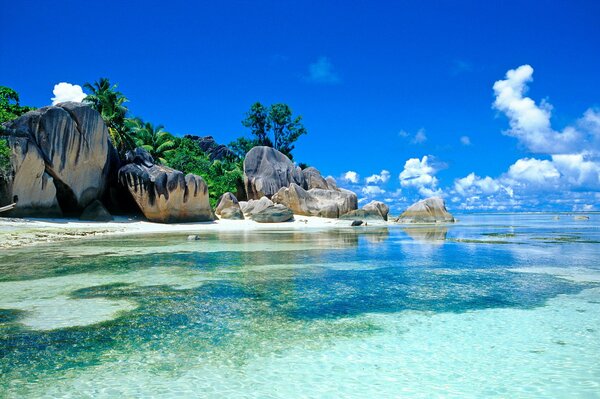 Tropical sea beach with rocks