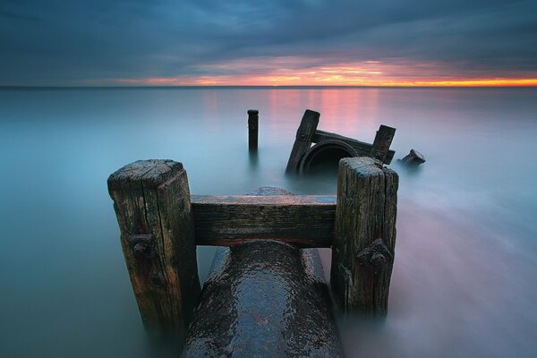 Supports standing in the quiet sea